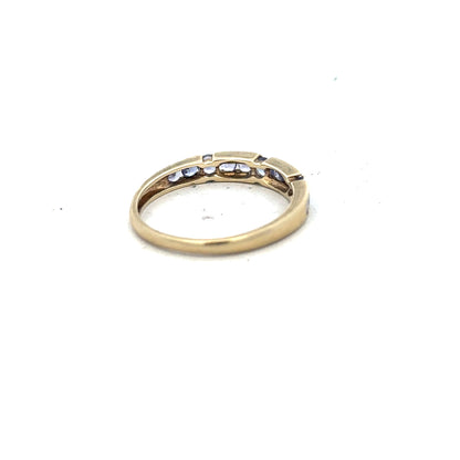 9ct yellow gold ring in size P with a smooth band, unbranded jewelry piece, shown on a plain background.