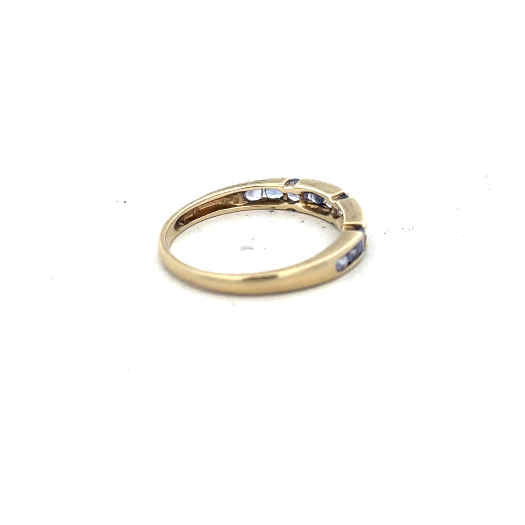 9ct yellow gold ring in size P with a simple band design, unbranded jewelry piece.