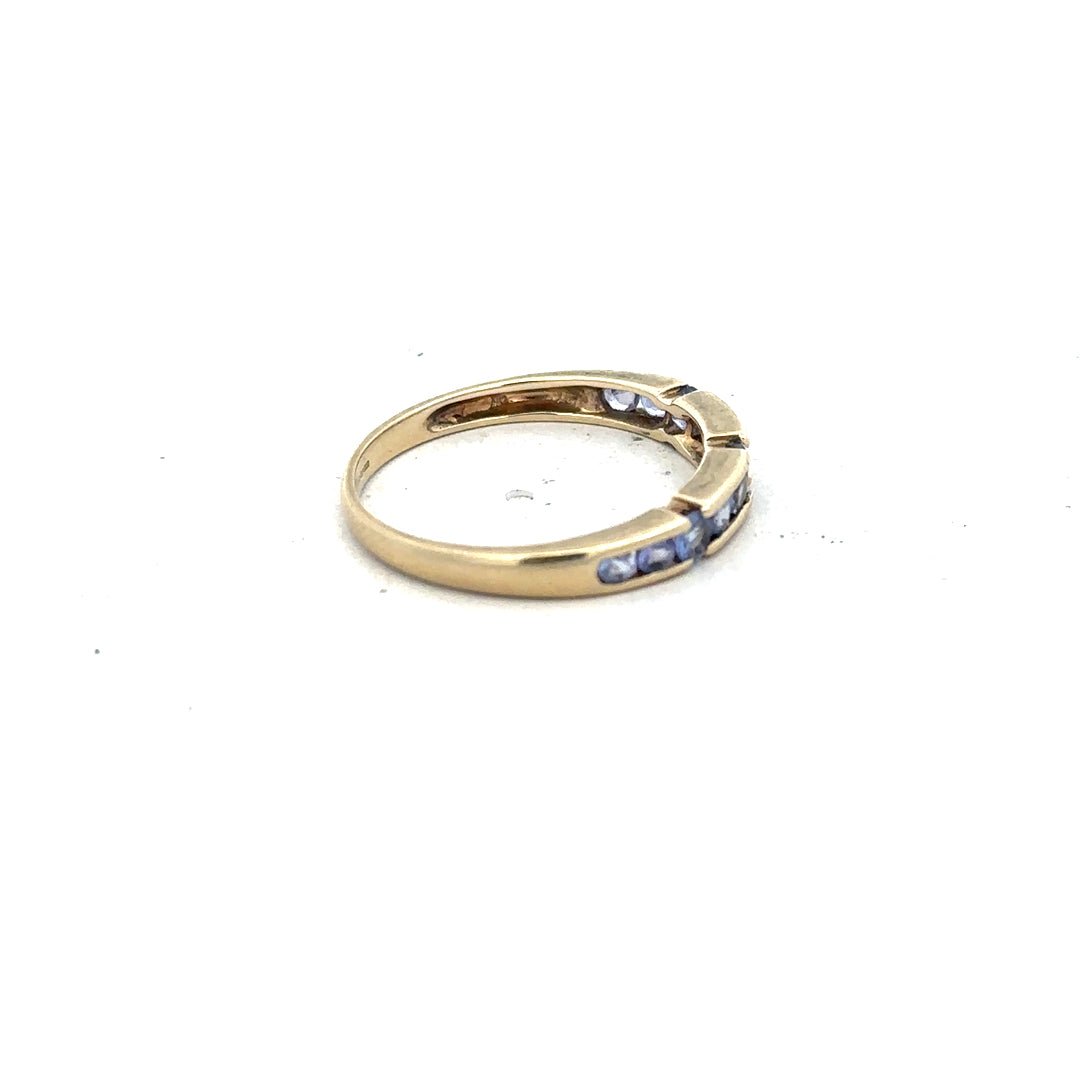 9ct yellow gold ring in size P with a smooth, polished band, unbranded jewelry showcasing classic gold craftsmanship.