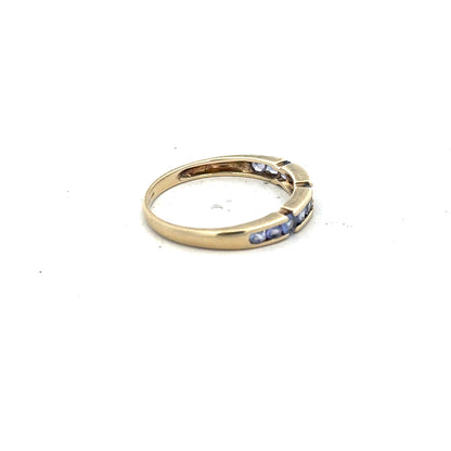 9ct yellow gold ring in size P with a smooth, polished band, unbranded jewelry showcasing classic gold craftsmanship.