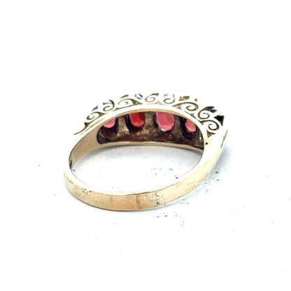 9ct yellow gold ring in size Q with a smooth band, unbranded jewelry piece displayed on a neutral background.