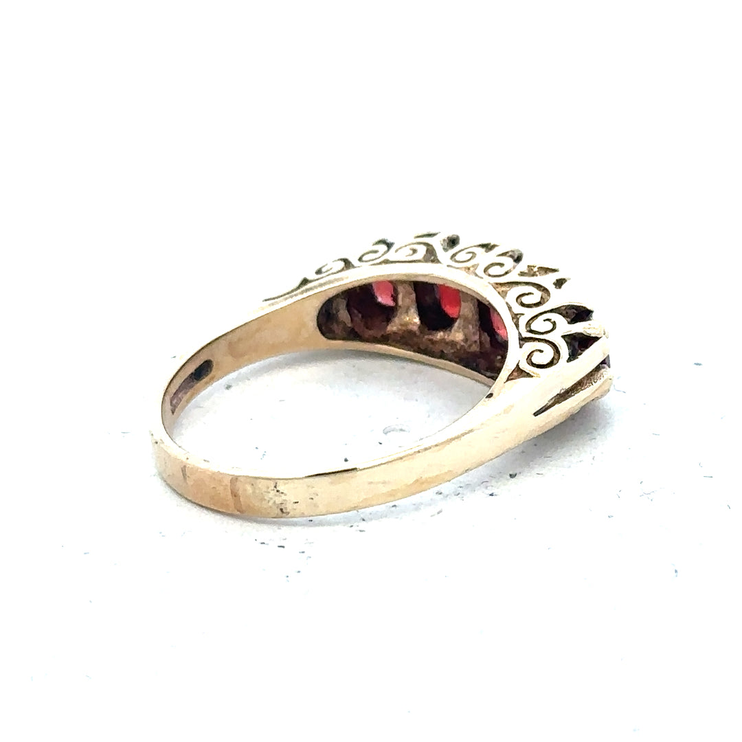 9ct yellow gold ring in size Q with a smooth band, unbranded jewelry, photographed on a plain background.