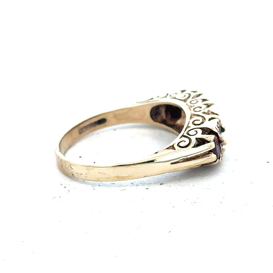 9ct yellow gold ring in size Q with a smooth polished band, unbranded jewelry displayed against a neutral background.
