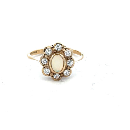 9ct yellow gold ring in size Q with a smooth band, unbranded jewelry piece displayed on a plain background.
