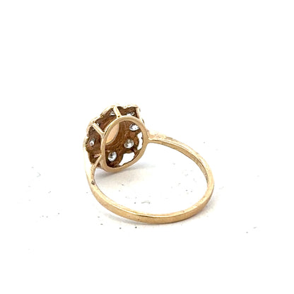 9ct yellow gold ring in size Q with a smooth band, unbranded jewelry piece displayed on a plain background.
