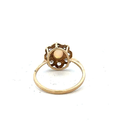 9ct yellow gold ring in size Q with a smooth band, unbranded jewelry, shown on a plain background.