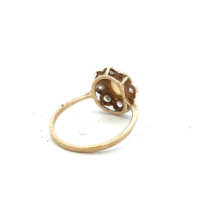9ct yellow gold ring in size Q with a simple band design, unbranded, shown in a close-up image.