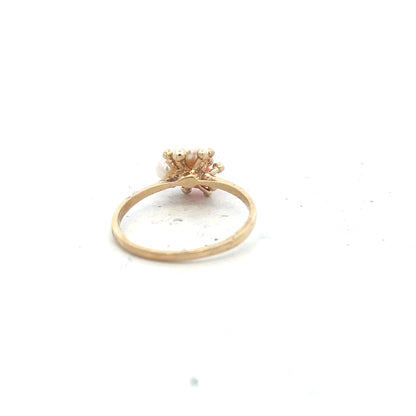 9ct yellow gold ring in size Q with a smooth, polished band, unbranded, shown from a side angle.