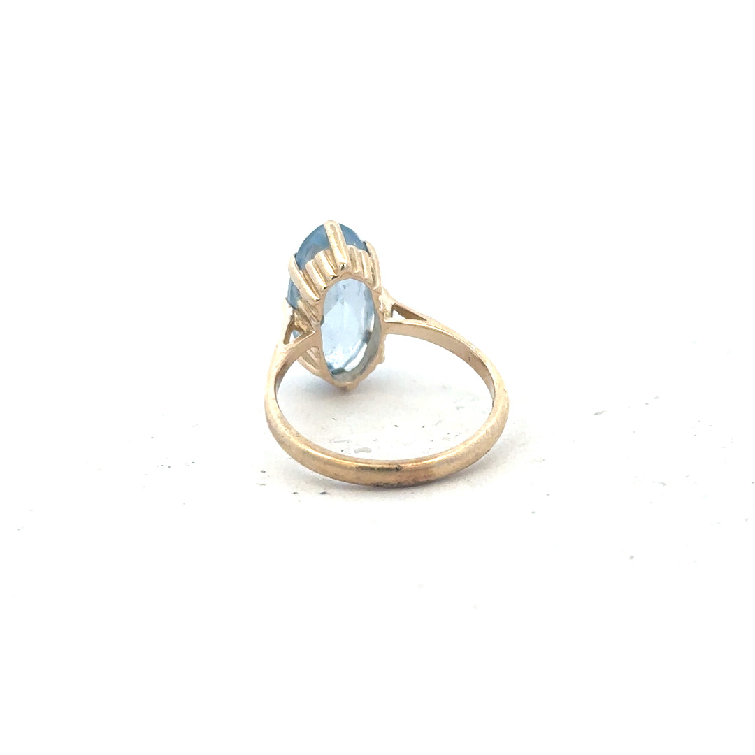 9ct yellow gold ring in size Q with a smooth polished finish, unbranded jewelry displayed on a plain background.