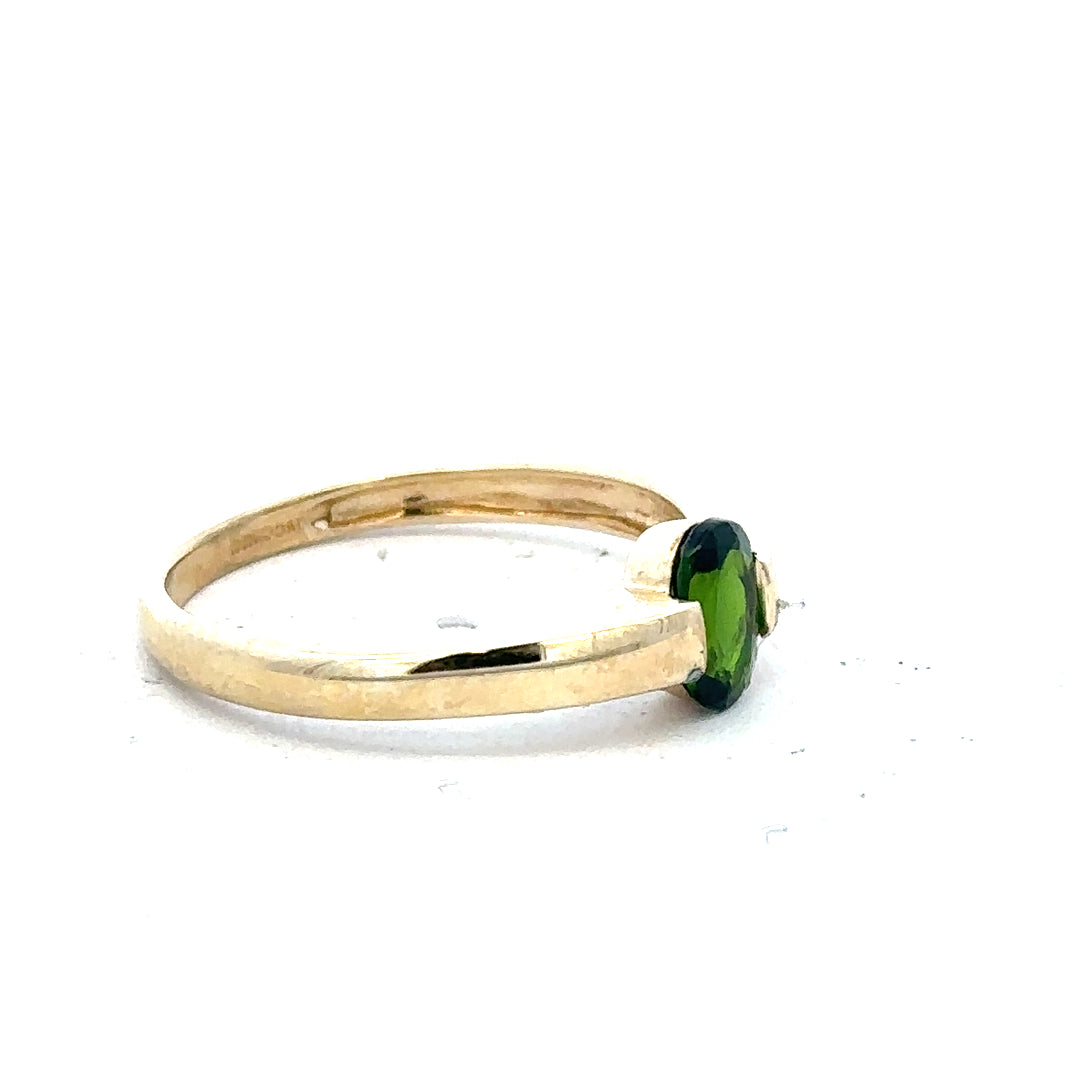 9ct yellow gold ring size R with a smooth polished finish, unbranded jewelry showcased in close-up.