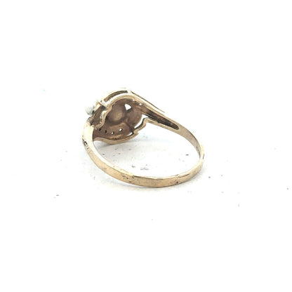 9ct yellow gold ring in size R, featuring a classic smooth band design, unbranded jewelry piece.