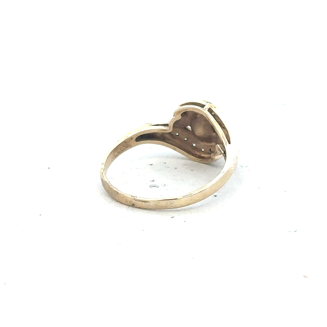 Elegant 9ct yellow gold ring in size R with a smooth polished finish, unbranded jewelry piece for everyday wear.