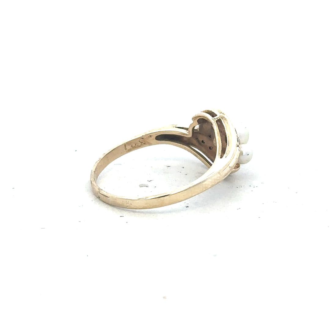 9ct yellow gold ring in size R with a smooth polished finish, crafted in unbranded jewelry style.