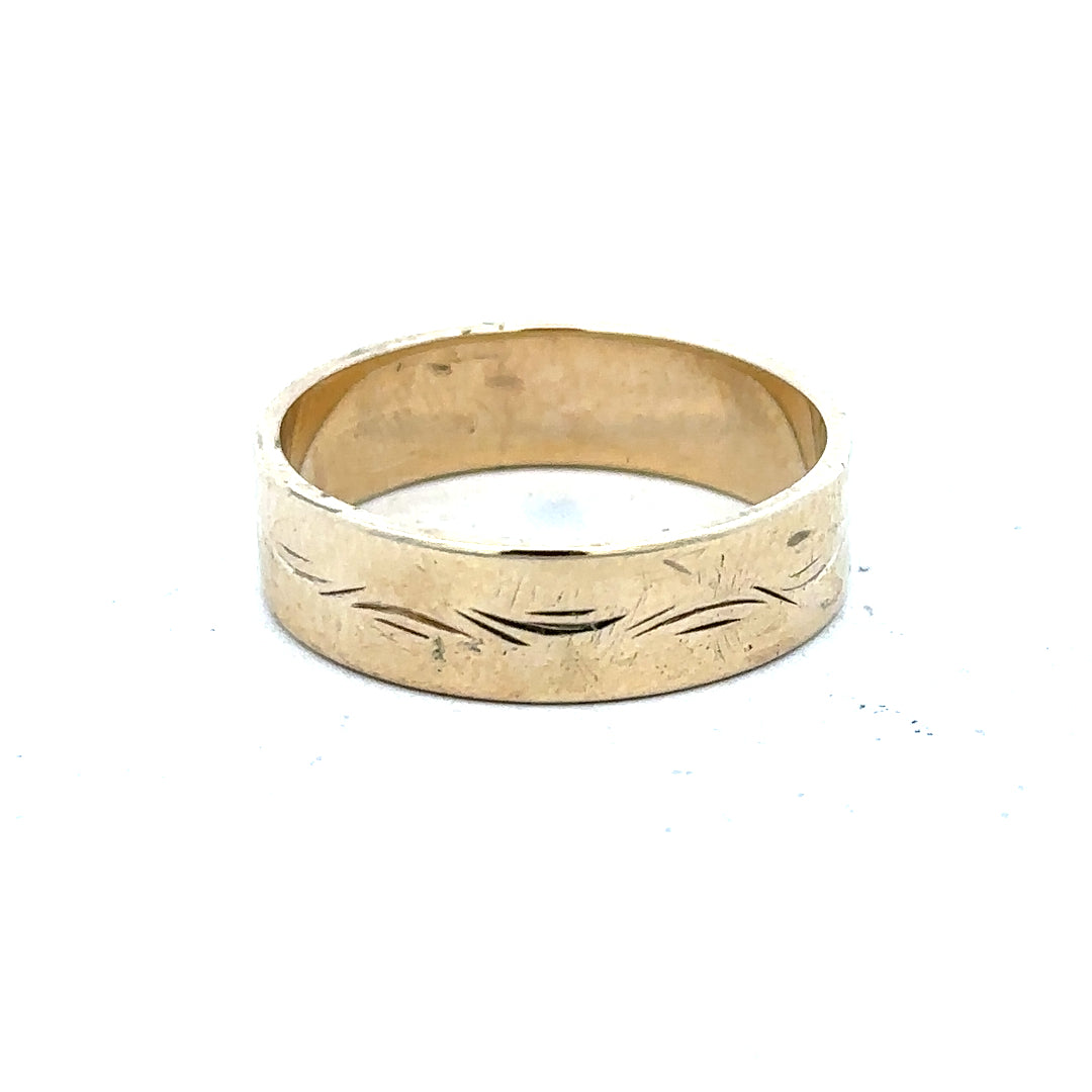 9ct yellow gold ring size S, unbranded jewelry with a smooth band, detailed close-up showing the gold finish and craftsmanship.