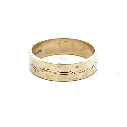 9ct yellow gold ring in size S with a simple, smooth band design, unbranded jewelry piece.