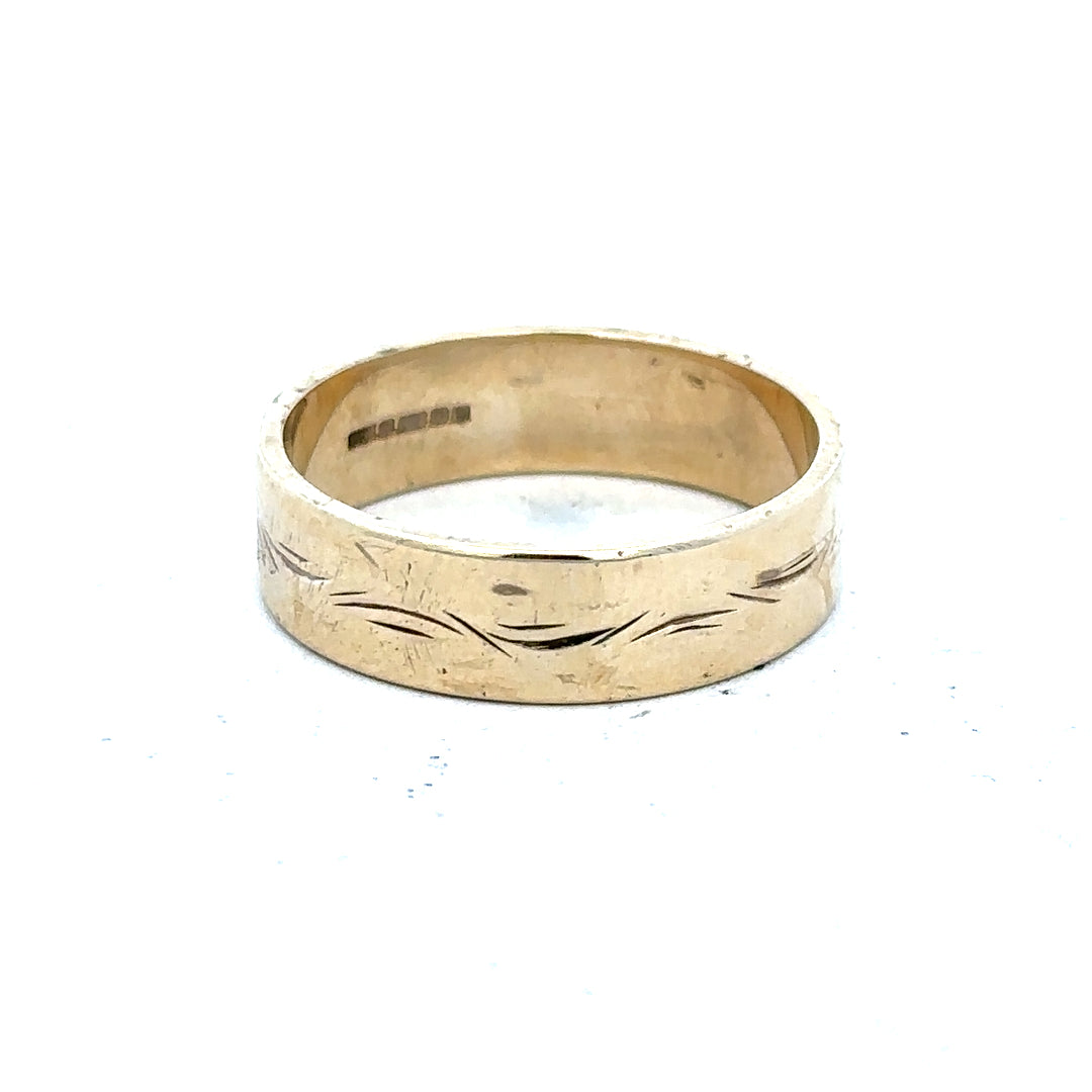 9ct yellow gold ring size S with a smooth polished band, unbranded, showcasing a simple elegant design.