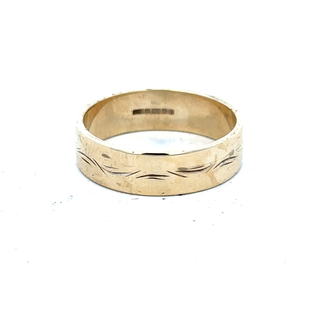 9ct yellow gold ring in size S with a simple band design, unbranded jewelry for everyday wear.