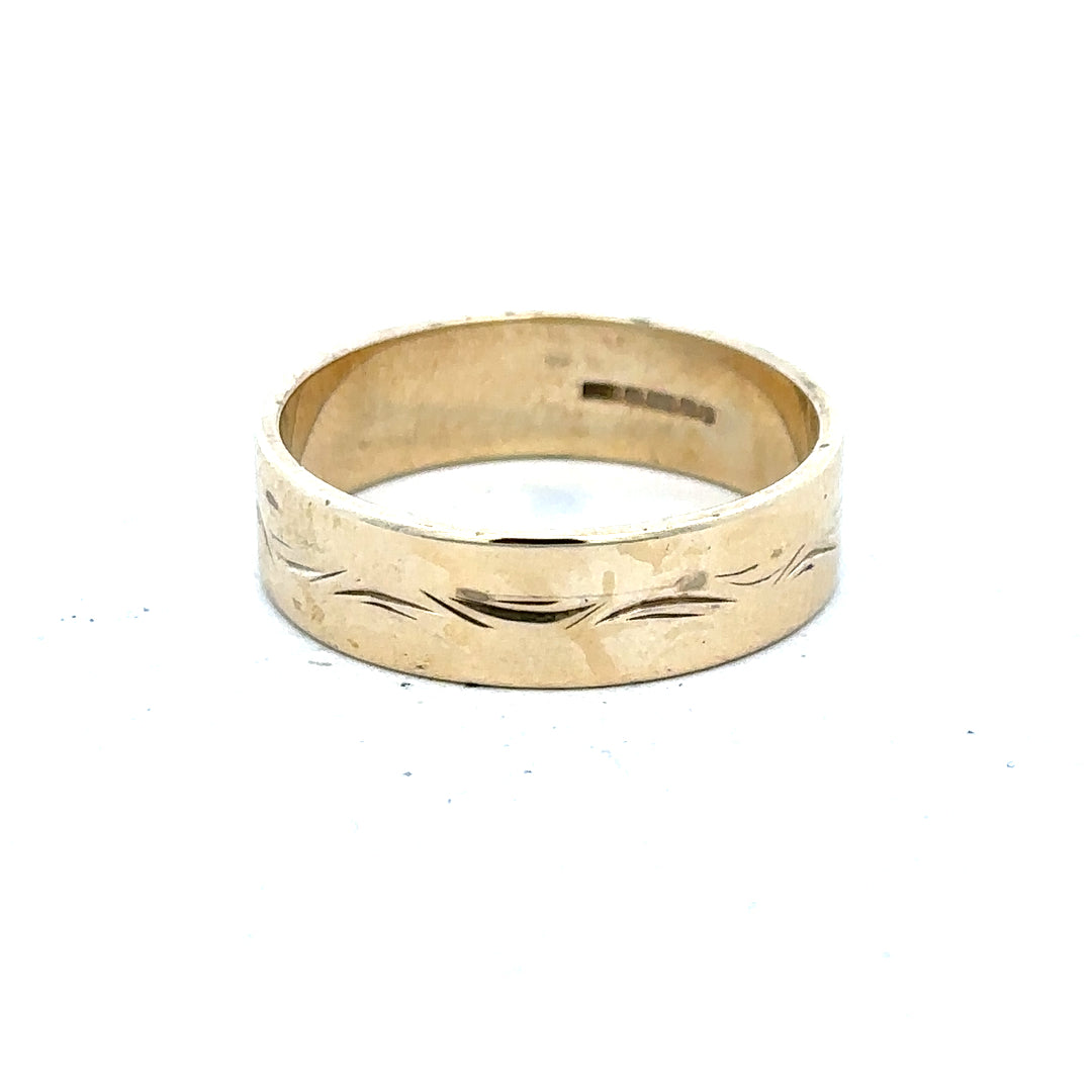 9ct yellow gold ring in size S with a smooth band, unbranded jewelry, displayed on a neutral background.