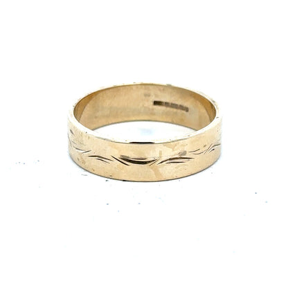 9ct yellow gold ring in size S with a smooth band, unbranded jewelry, displayed on a neutral background.