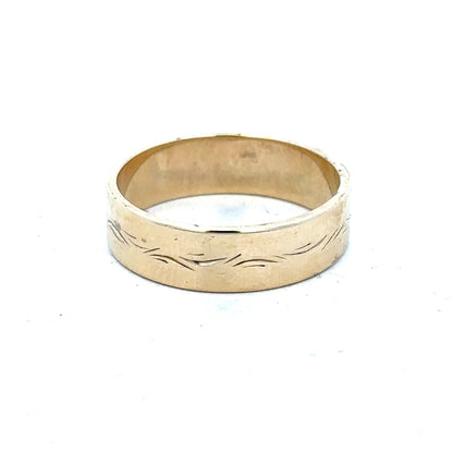 9ct yellow gold ring size S with a smooth polished finish, unbranded jewelry piece displayed on a plain background.
