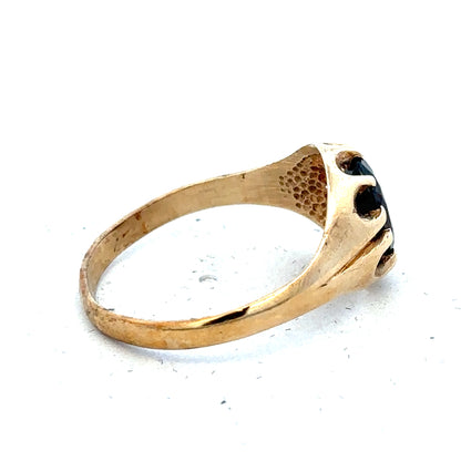 9ct yellow gold ring in size T with a smooth band, unbranded jewelry, shown from a side view on a plain background.
