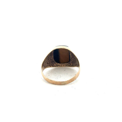 9ct yellow gold ring size T1/2, unbranded, featuring a simple smooth band, shown in a close-up view.