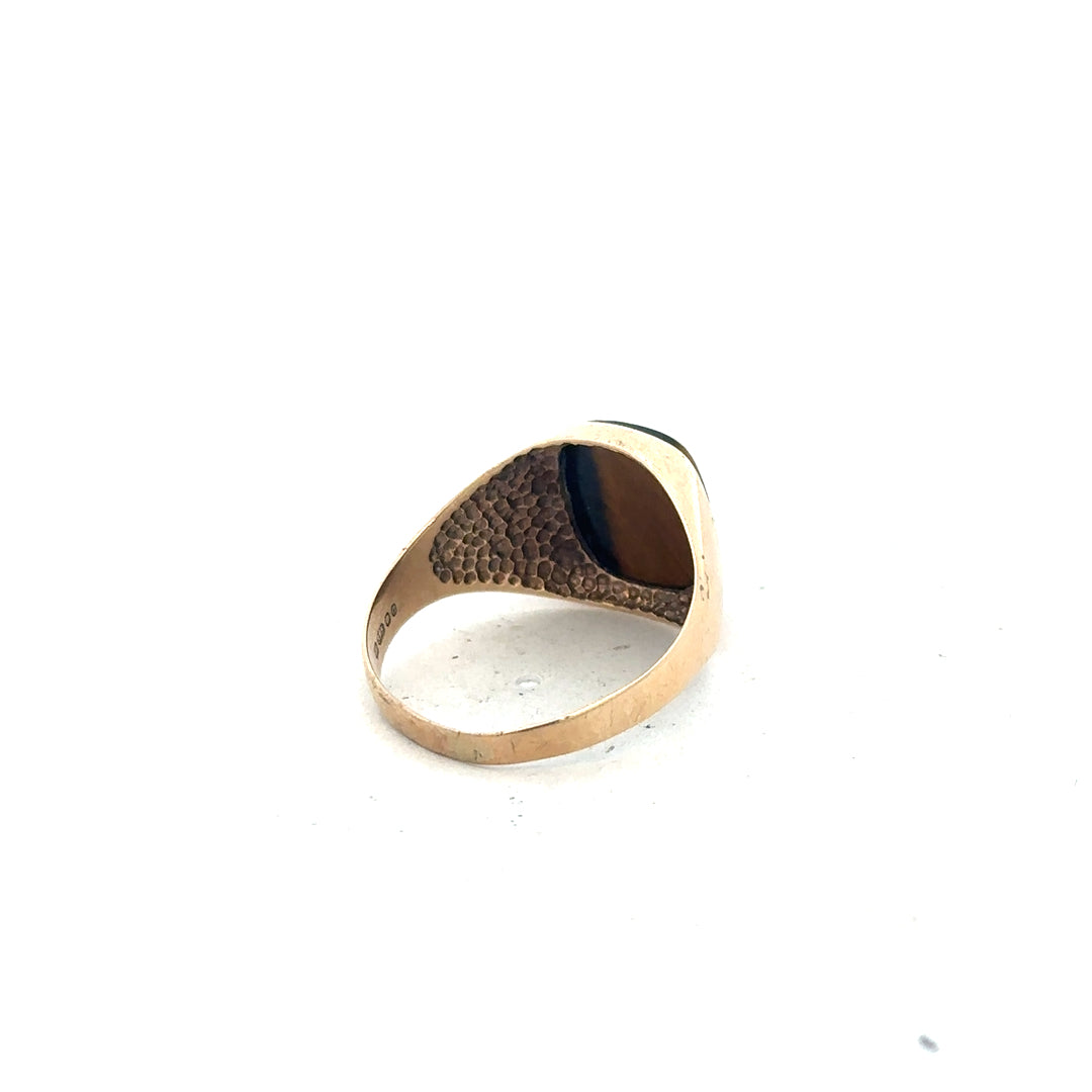 9ct yellow gold ring size T1/2 with a polished finish, showcasing a classic design and smooth band.