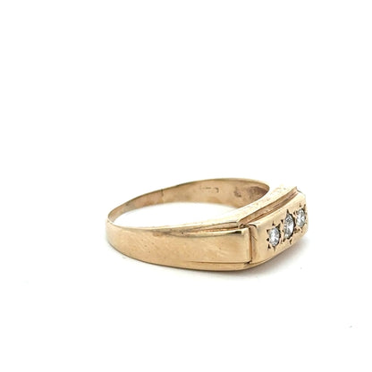 9ct yellow gold ring in size W, featuring a simple band design, unbranded, shown in a close-up image.