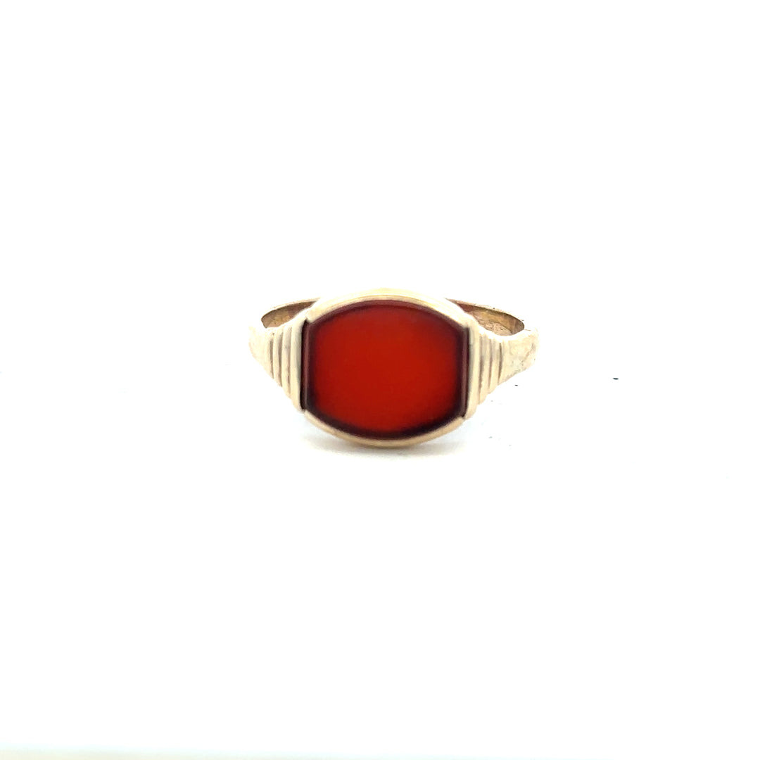 9ct yellow gold ring size Y1/2, unbranded, with a smooth polished surface, shown from a side view.