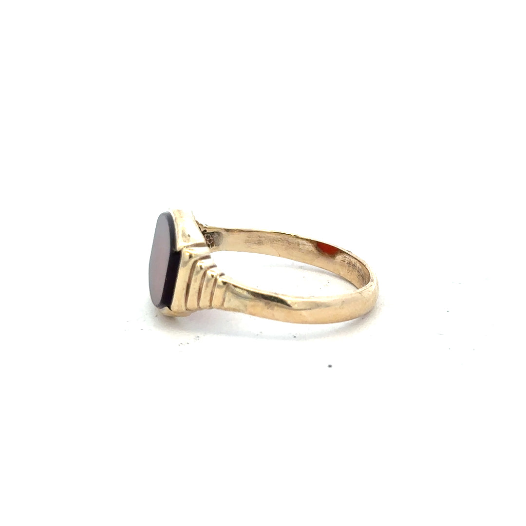 9ct yellow gold ring in size Y1/2, unbranded, showcasing a smooth band with a polished finish.