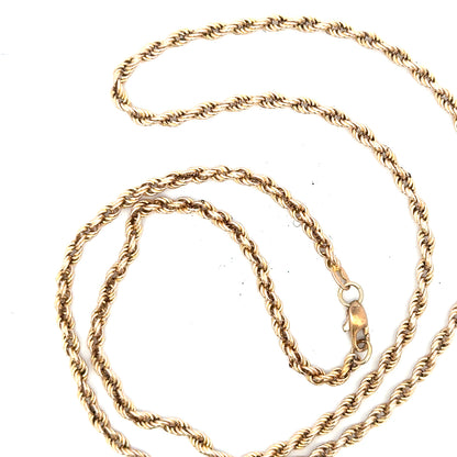 9ct yellow gold rope chain, unbranded, with a sturdy design, weighing 16.5g. Close-up of the textured gold chain.