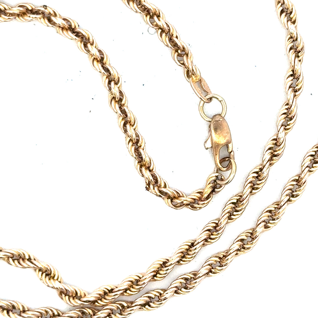 9ct yellow gold rope chain, unbranded, with a detailed view showing its twisted design and polished finish.