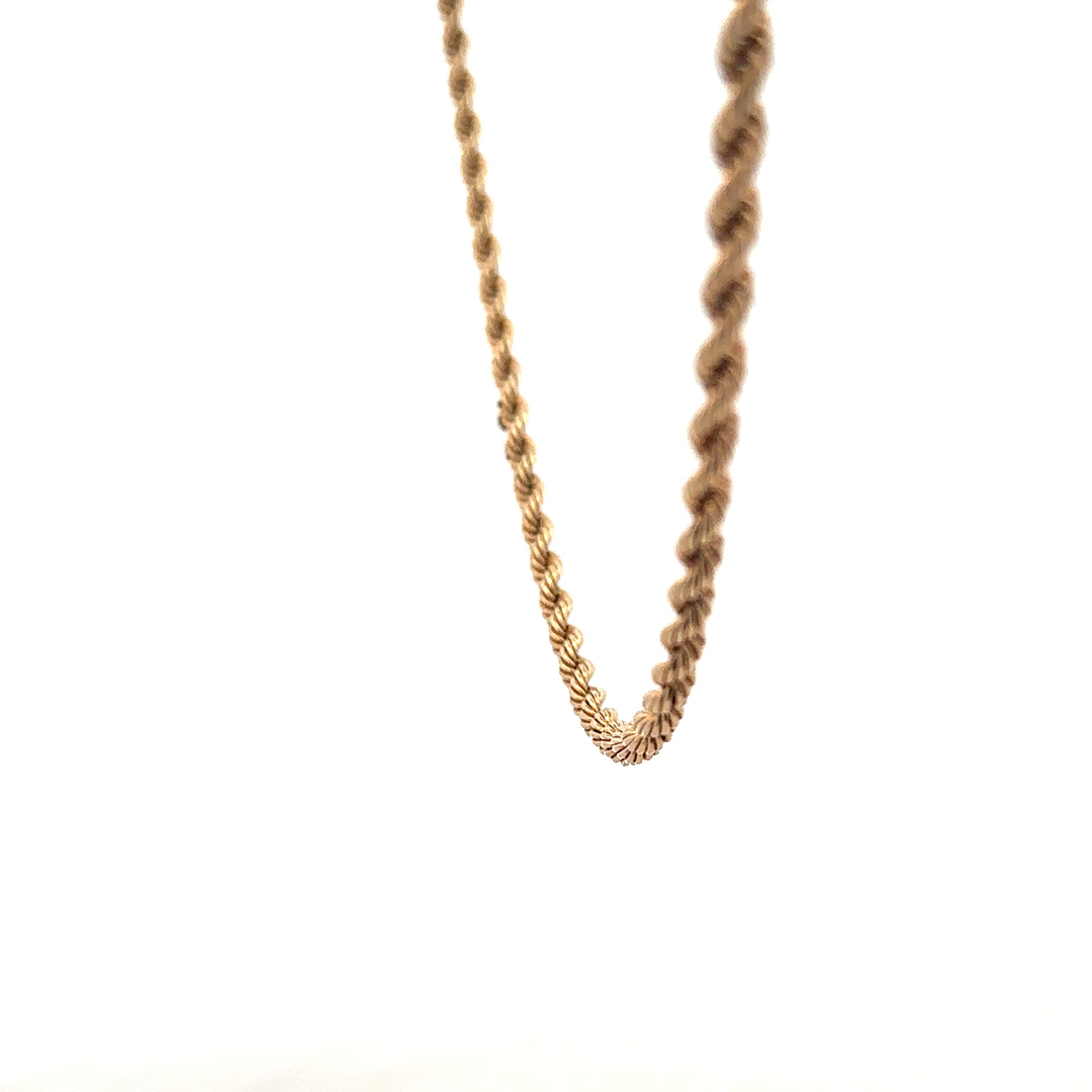 9ct yellow gold rope chain, unbranded, weighing 5.5g, featuring a detailed twisted gold design.