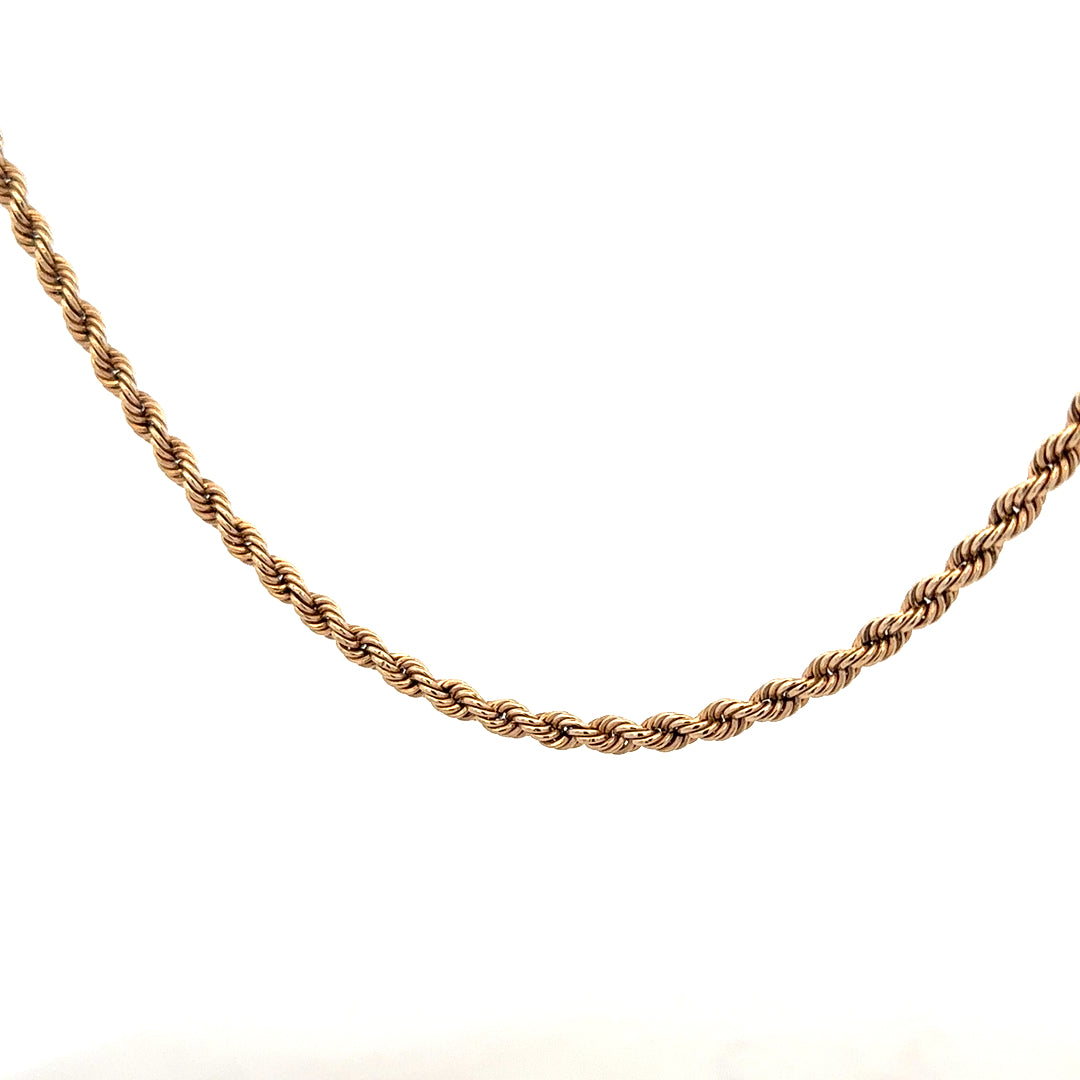 9ct yellow gold rope chain, unbranded jewelry, 5.5g, showing the detailed twisted rope design and polished finish.
