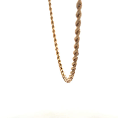 9ct yellow gold rope chain, unbranded, showcasing its twisted design and polished finish, weighing 5.5 grams.