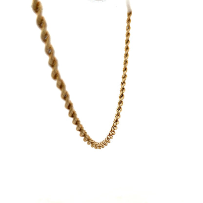 9ct yellow gold rope chain, unbranded, 7.2g, close-up view showing the twisted rope design and polished finish.