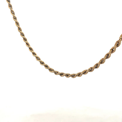 9ct yellow gold rope chain, unbranded, 7g, showcasing its detailed twisted design and polished finish.