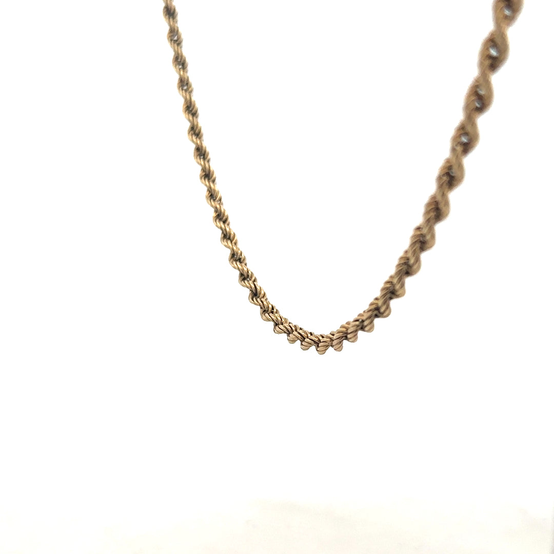 9ct yellow gold rope chain, unbranded, showing detailed twisted design and secure clasp, weighs 7 grams.