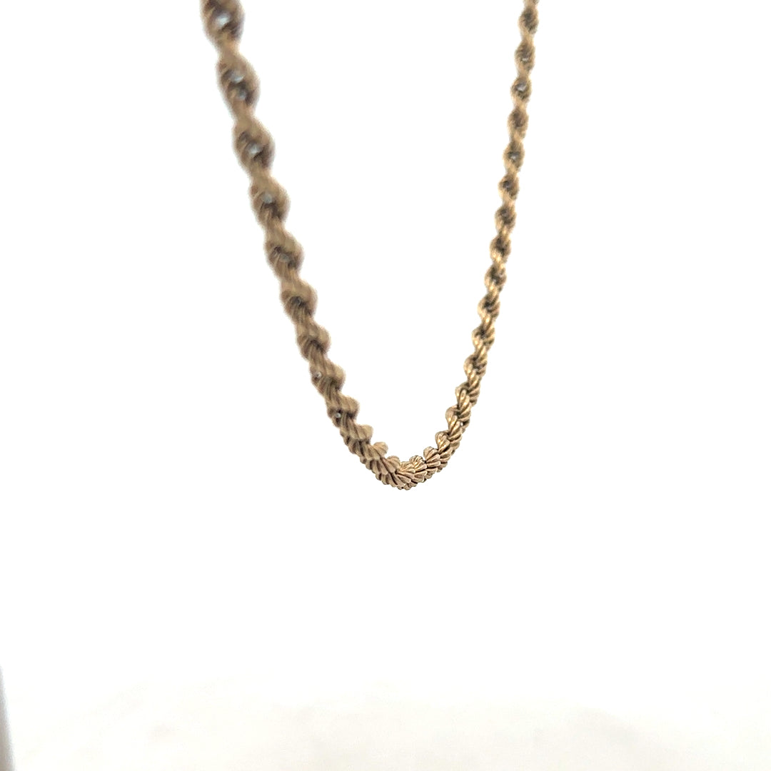 9ct yellow gold rope chain, unbranded, showcasing its twisted design and polished finish, weighing approximately 7 grams.
