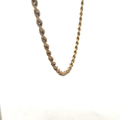 9ct yellow gold rope chain, unbranded, showcasing its twisted design and polished finish, weighing approximately 7 grams.