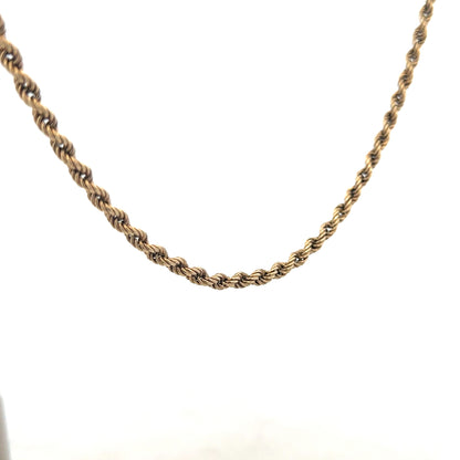 9ct yellow gold rope chain, unbranded, 7g, detailed close-up showing the twisted rope design and polished finish.