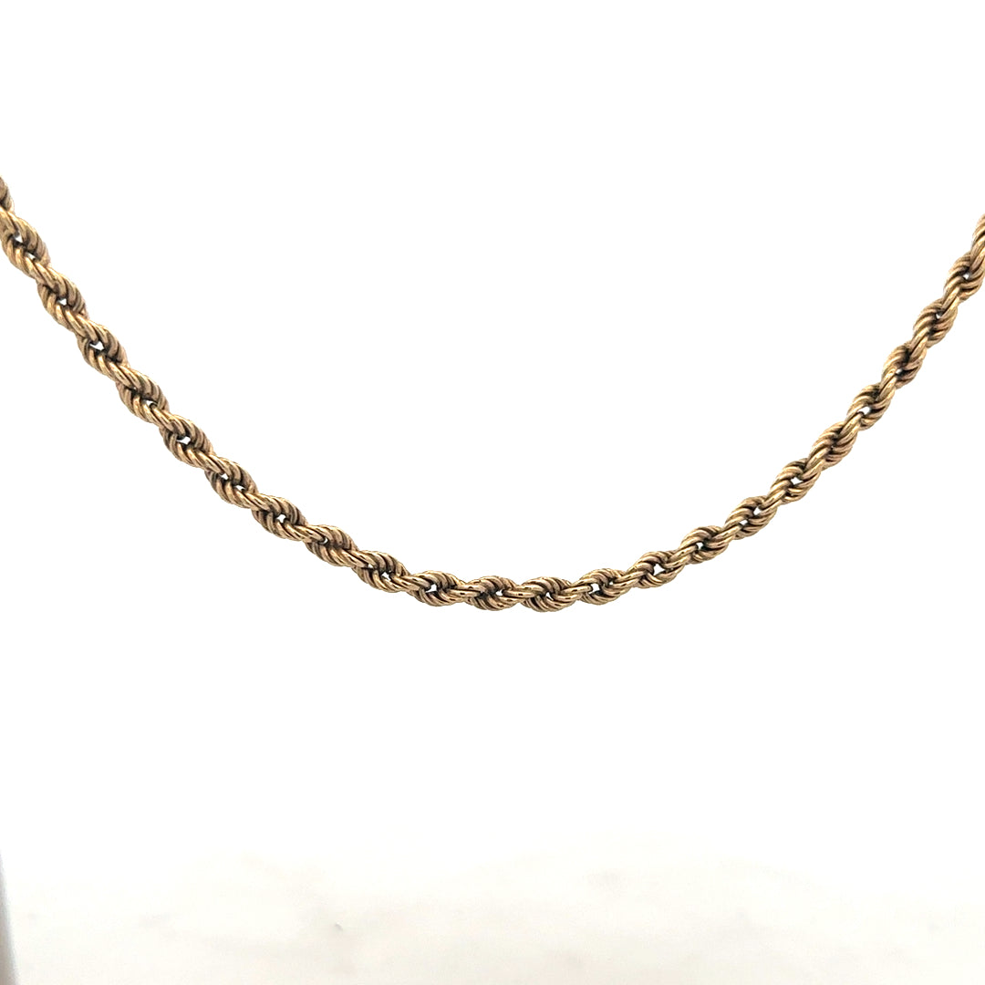 9ct yellow gold rope chain, unbranded, 7g, showing the detailed twisted design and polished finish of the jewelry.