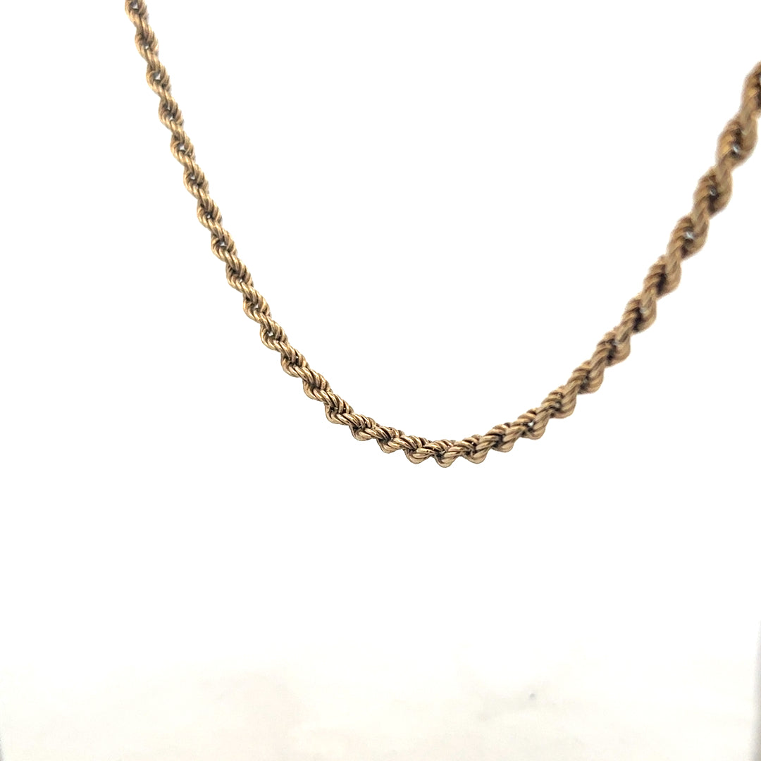 9ct yellow gold rope chain, unbranded, 7g, with detailed woven design, showcasing the elegant jewelry piece.