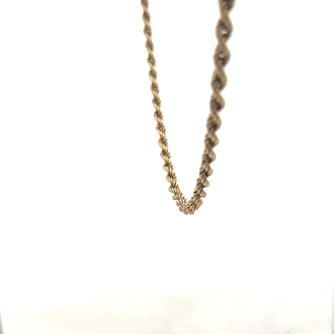 9ct yellow gold rope chain, unbranded, 7g, showcasing the detailed twisted design and polished finish.