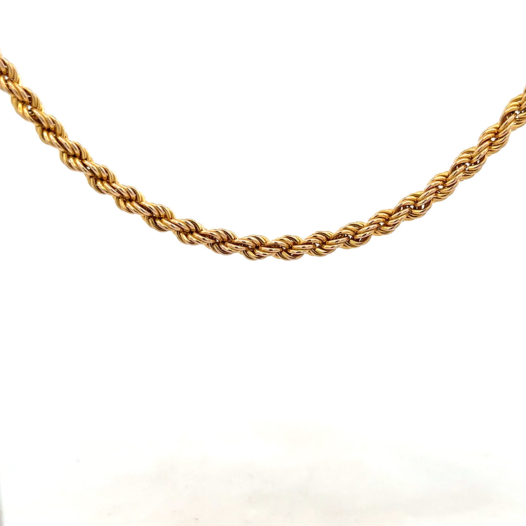 9ct yellow gold rope chain weighing 9.4g, showcasing a detailed twisted design and polished finish.