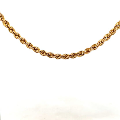 9ct yellow gold rope chain weighing 9.4g, showcasing a detailed twisted design and polished finish.