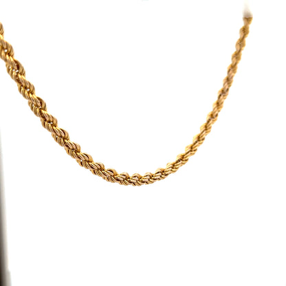 9ct yellow gold rope chain weighing 9.4g, unbranded jewelry chain with intricate twisted design and secure clasp.