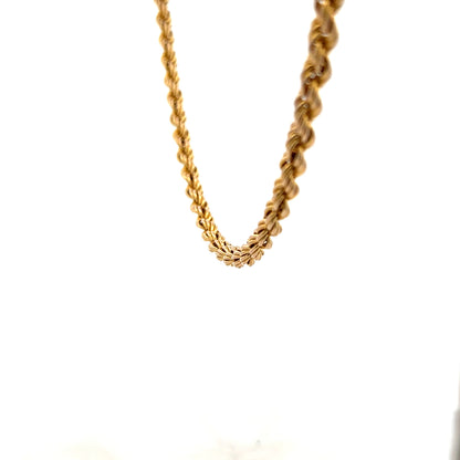 9ct yellow gold rope chain weighing 9.4g, featuring a twisted design and secure clasp, unbranded jewelry accessory.