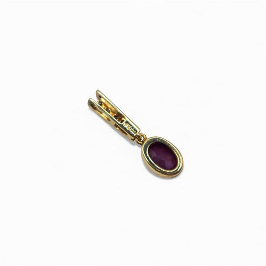 9ct yellow gold ruby and diamond pendant featuring a central ruby surrounded by sparkling diamonds, unbranded jewelry accessory.