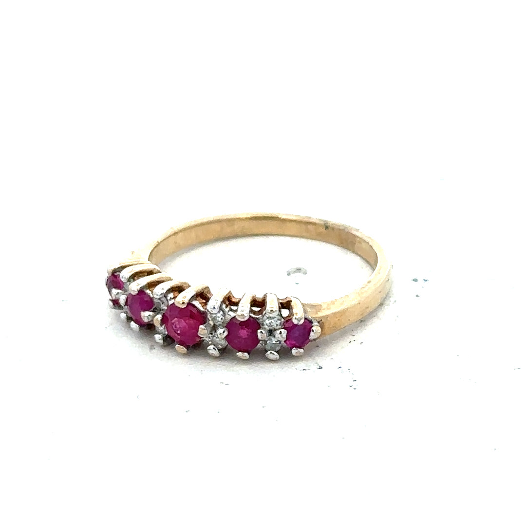 9ct yellow gold ring with ruby and diamond accents, size J1/2, featuring a classic design and elegant craftsmanship.